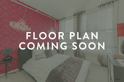 a bedroom with a bed and the words floor plan coming soon